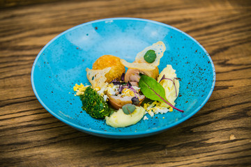 Detail on special designe for food on a wooden board.Food detail