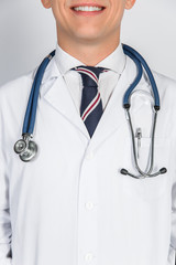 Professional medical team posing, doctor's lab coat and stethoscope close up