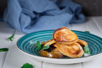 Delicious sandwich ingredients fall in the air on an isolated gray background