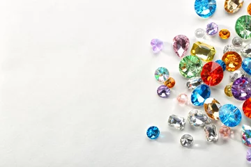 Schilderijen op glas Colorful precious stones for jewellery on white background © Africa Studio