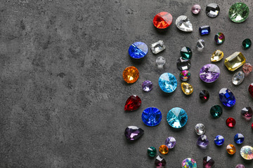 Colorful precious stones for jewellery on dark background