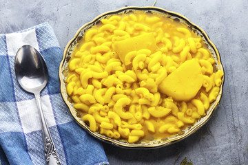 algerian traditional macaroni tajine with potato
