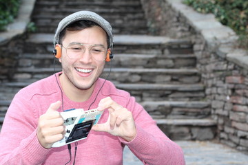 Guy listening to Stereo cassette Walkman in the 80s or the 90s