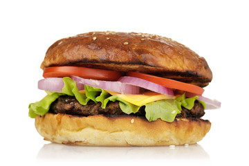 Freshly cooked hamburger with vegetables and cutlet. Home-made sandwich  isolated on white background, closeup