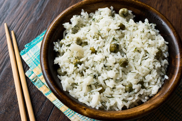 Cooked Plain Basmati Rice with Dill and Green Peas / Pilav or Pilaf Served with Chopsticks.