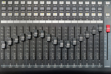 Sound mixer panel with feyder and buttons of control the top view background