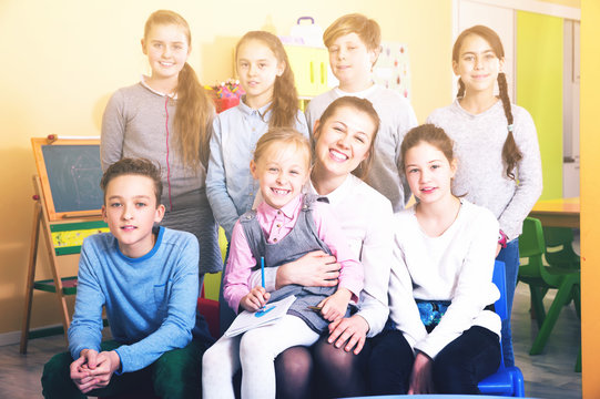 Kids with teacher in classroom