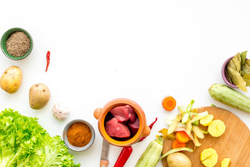 Diet vegetarian vegan food. Ratatouille or vegetable ragout. White table background top view mockup