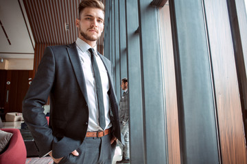 Portrait of an handsome businessman in an urban setting.