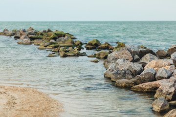 rocks on edge of ocean. Seashore