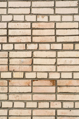 Background of the damaged old brick wall with horizontal masonry