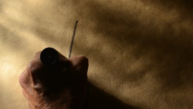 man writing FYI with marker