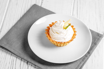 Sweet lemon cake with cream. The concept of food, desserts, restaurant.