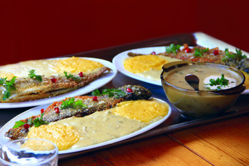 Trout fried with banusz and mushroom soup. Tasty dish