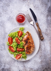 Grilled chicken breast with vegetable salad