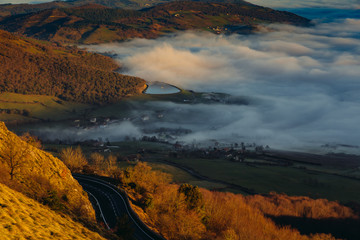 Between Basque mountains dawning in the fog, Spain