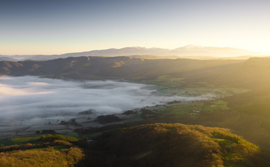 Dawning under the fog and a frost the valley of Orduña, Spain