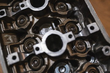 Motor head, valve, cam-shaft, from a motorcycle or car. Close-up shot 