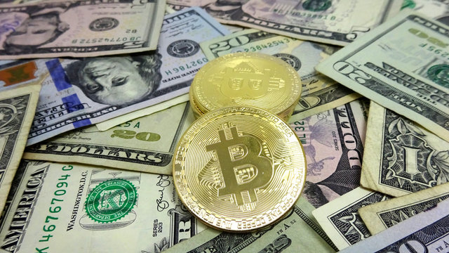 Bitcoin and Dollar Bills. Photo Image Composition