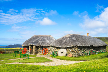 Fototapeta na wymiar Traditional stone farmhouse at Skye Museum of Island Life, Isle of Skye, Scotland, Britain