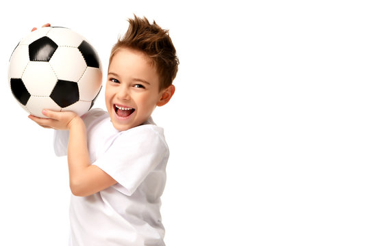Fan sport boy player hold soccer ball celebrating happy smiling laughing free text copy space