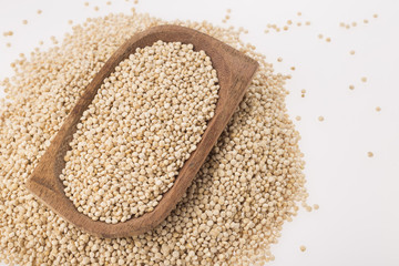 Quinoa grains in bowl isolated on white background, Chenopodium quinoa