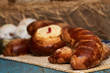 Russian homemade pie, loaf cake with nuts on rustic wooden table background, close-up. Delicious russian national dessert sweet pastry