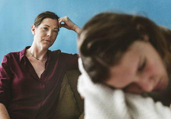 Mother and teenage daughter having an argument