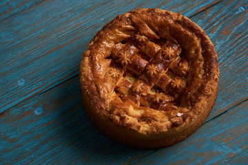 Traditional slavic russian and ukranian festivals and weddings bread Round Loaf Karavai pastry on wooden rustic table 