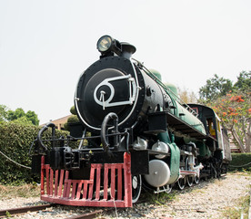 Fototapeta na wymiar Vintage Steam engine locomotive train