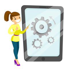 Young caucasian white business woman pointing at big tablet computer with cogwheels on screen. Business technology, strategy, teamwork concept. Vector cartoon illustration isolated on white background
