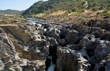 Pulo do Lobo (Wolf's leap) waterfall and cascade of river Guadiana, Alentejo, Portugal
