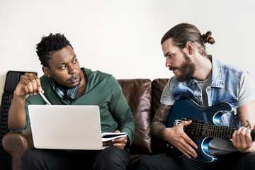 Musicians in a songwriting process collaboration and music concept