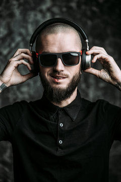 bearded man with headphones