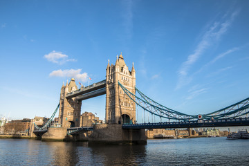 Fototapeta na wymiar Tower Bridge is a combined bascule and suspension bridge in London built between 1886 and 1894. The bridge crosses the River Thames close to the Tower of London.