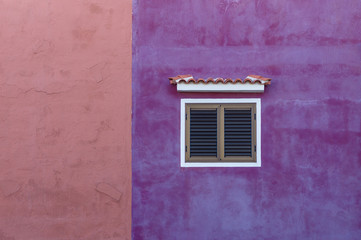 Colorful house wall with window