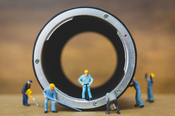 Miniature people : Worker team checking The pipe , Plumbing repair service concept

