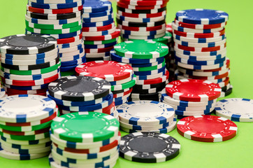 poker chips on a green table close-up