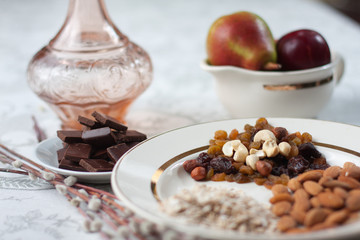 still life with nuts, fruits and chocolate