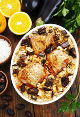 Chicken thigh baked with rice, eggplant and figs