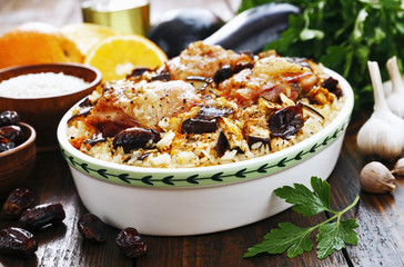 Chicken thigh baked with rice, eggplant and figs
