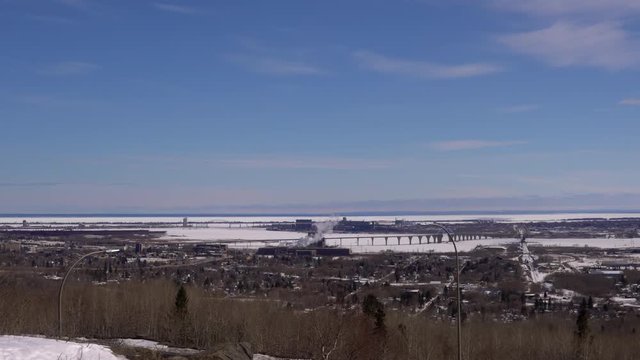 Beautiful wide view of Duluth, Minnesota from high above the city on a calm sunny winter day