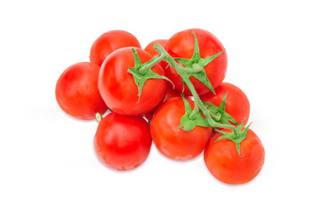 Branches of the ripe red tomatoes on a white background