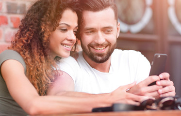 Beautiful couple having coffee on a date,having fun together.