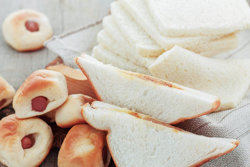 Bread on wooden floor.