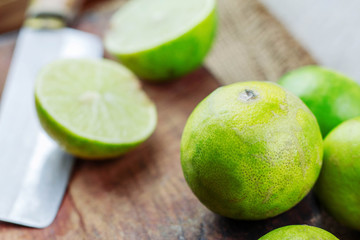 Many limes on wooden.
