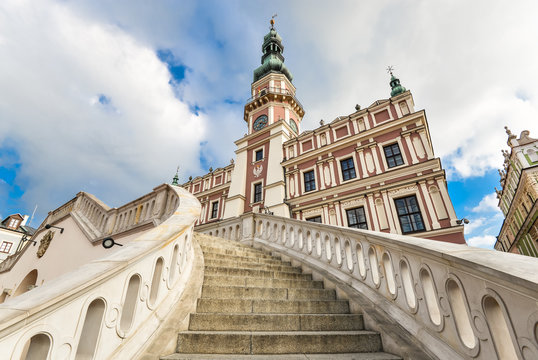 Zamosc, Poland - August 23, 2017: Beautiful ancient Town Hall of Zamosc and dramatic sky.  Town Zamosc is  UNESCO World Heritage List site.
