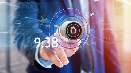 Businessman holding a Button of a smart home automation app - 3d rendering