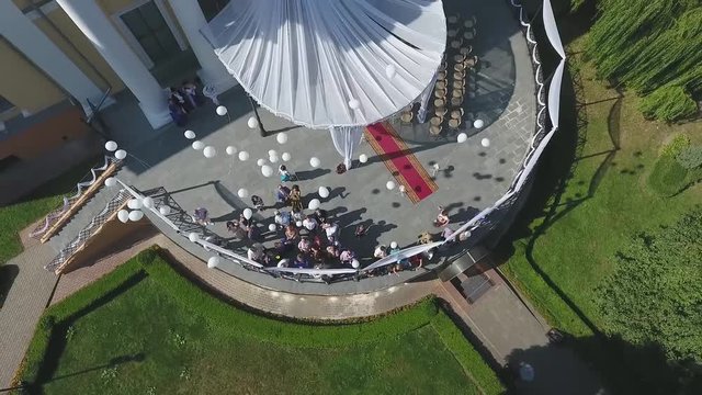 Aerial cinematic view of of the city center of gomel. Balls flying in the sky over Palace of the Rumyantsevs and Paskevichs. Lenin Square. Quadcopter drone unique high altitude flight over city.