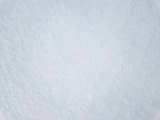 Snow-covered field. Aerial view. White texture